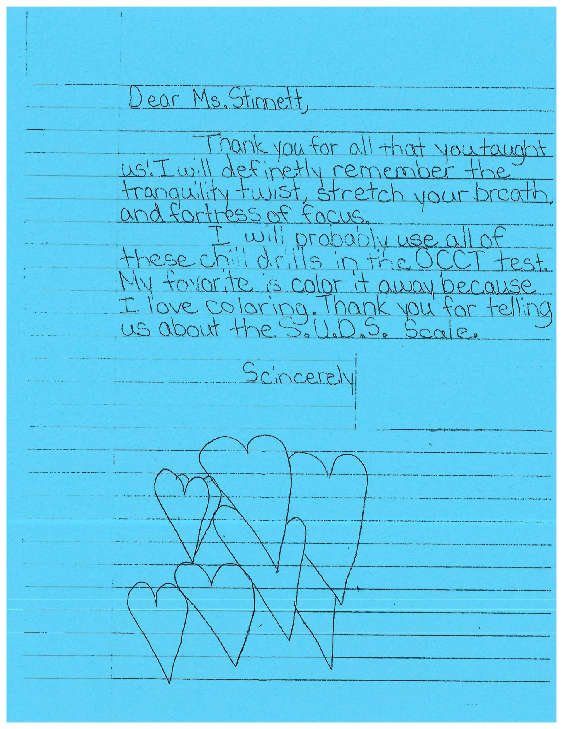 A blue piece of paper with the word dear written on it