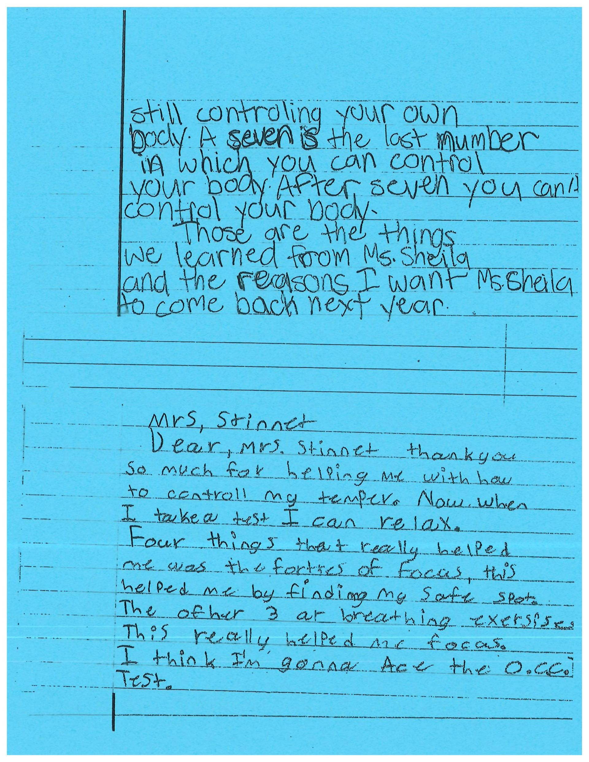 A blue piece of paper with arabic writing on it