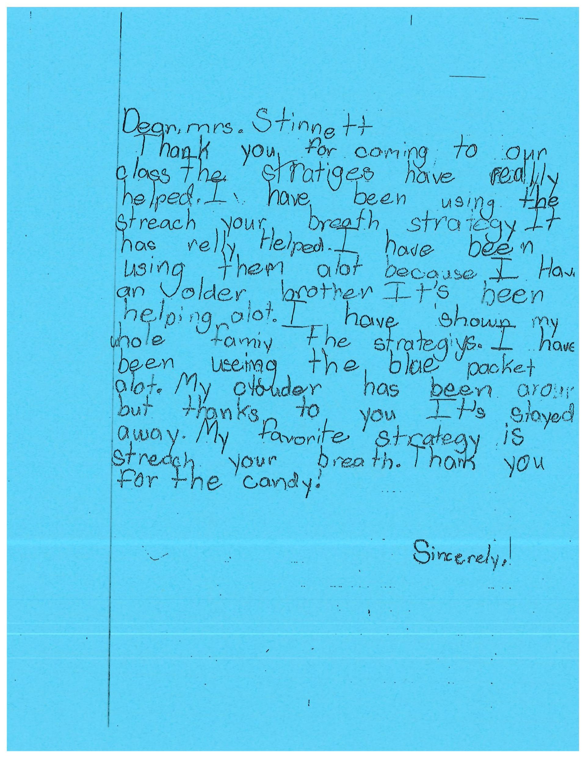 A blue piece of paper with a lot of writing on it