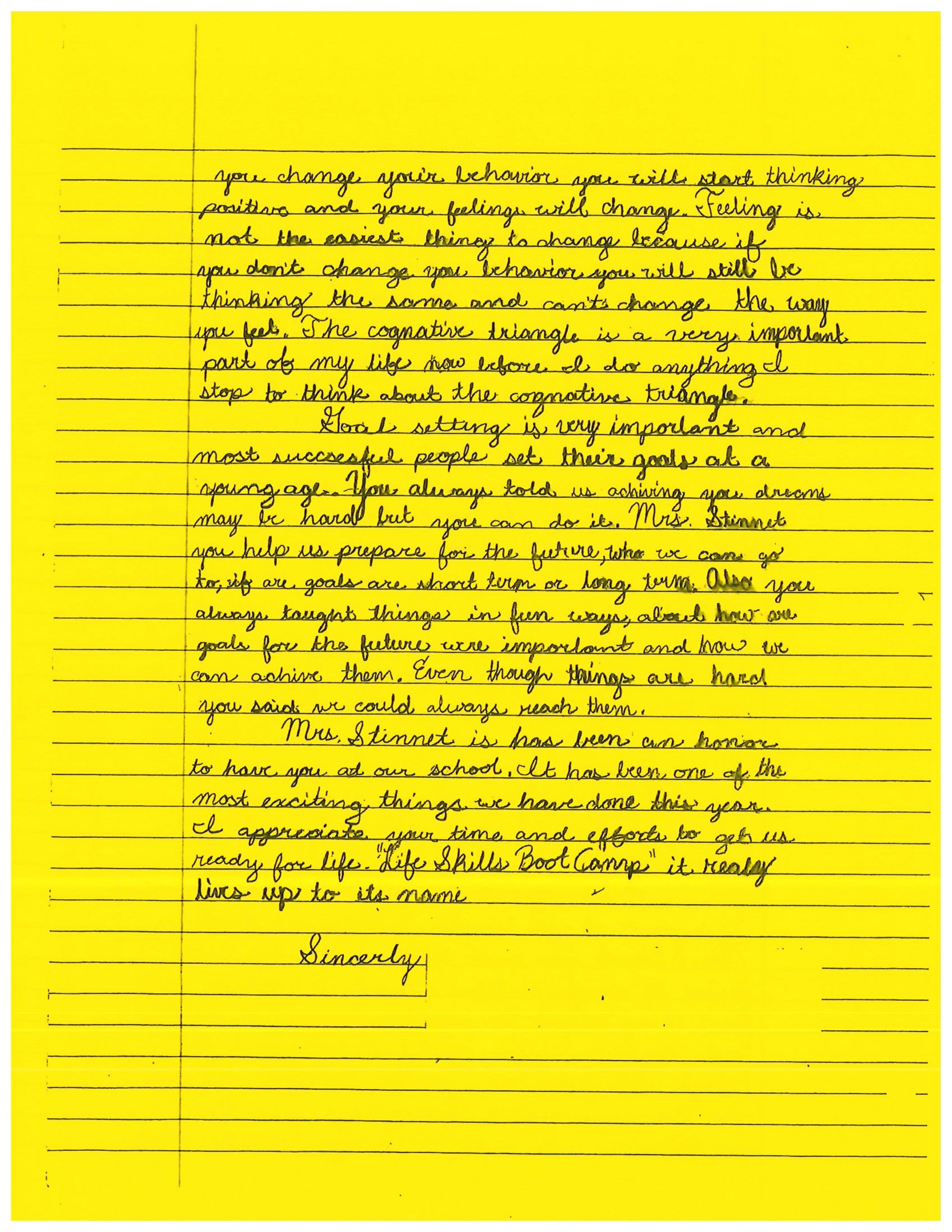 A yellow piece of paper with a lot of writing on it
