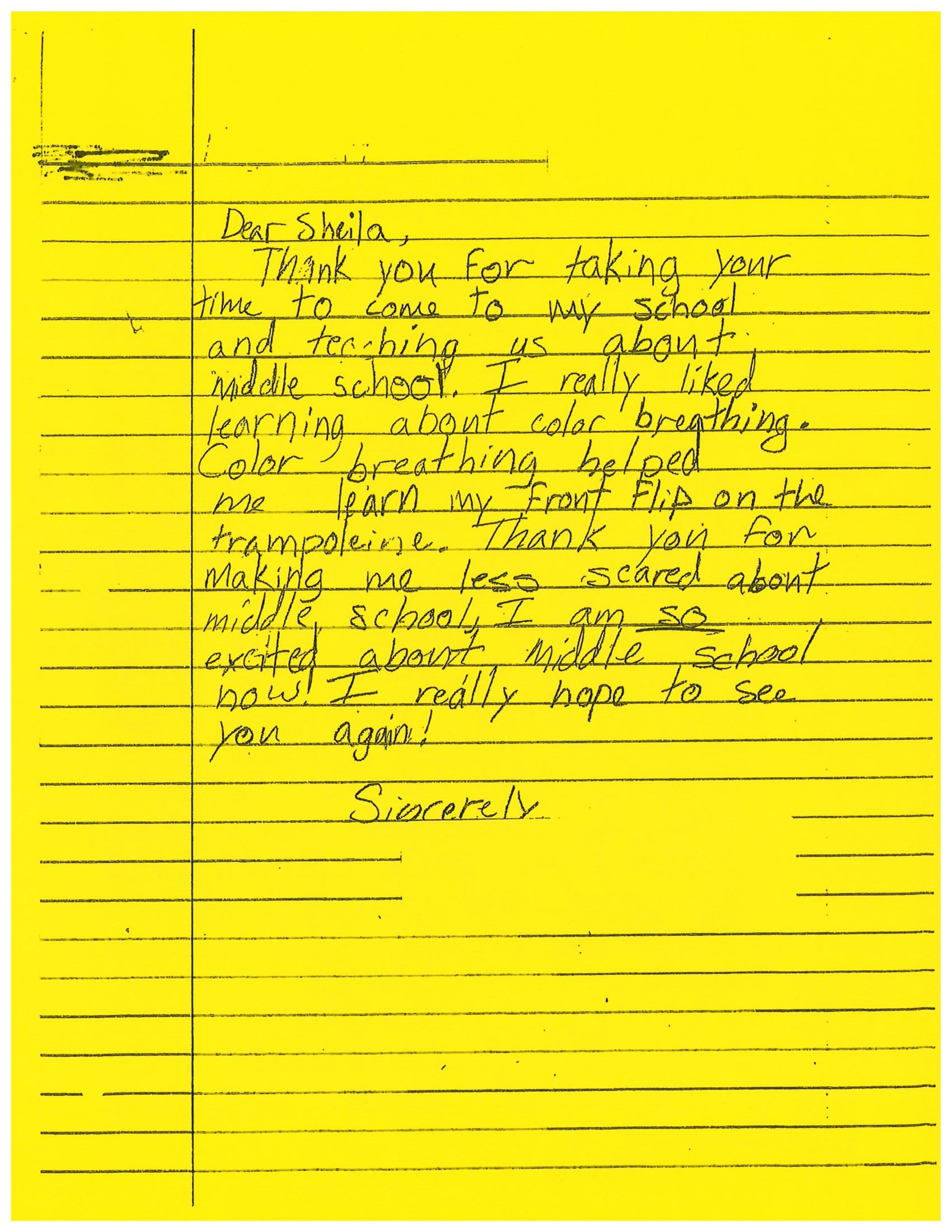 A yellow piece of paper with black writing on it