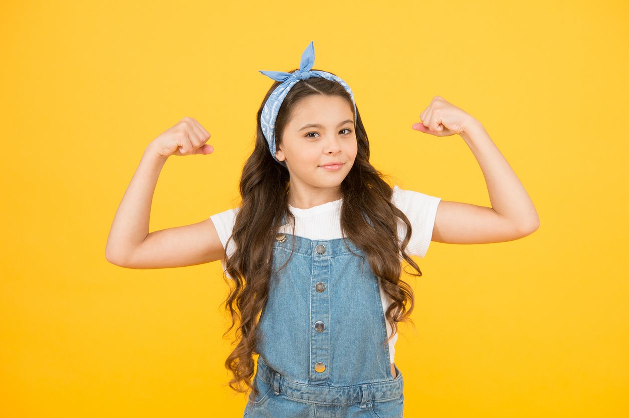 Girl flexing her muscles