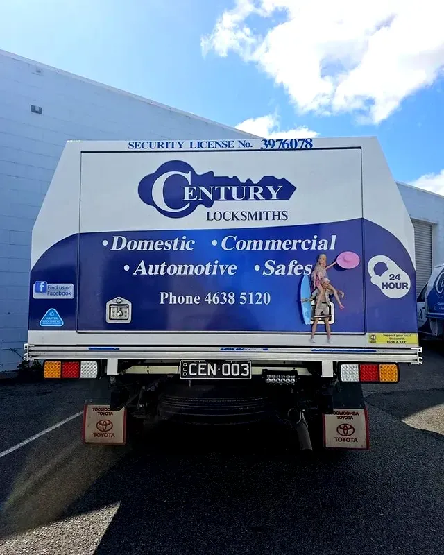 A Century Locksmiths Truck Is Parked in Front of A Building — Century Locksmiths In Toowoomba City, QLD