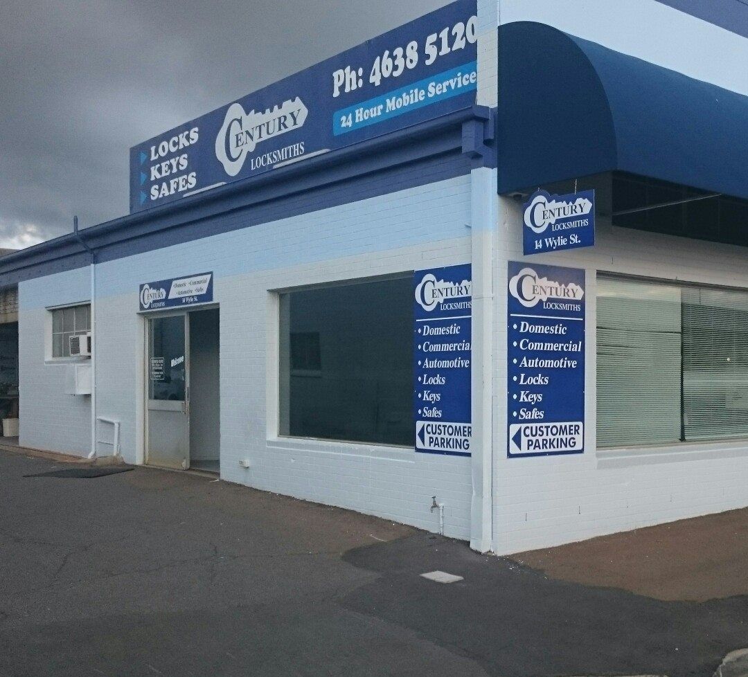 A Close up Of a Car Key in A Lock on A Table — Century Locksmiths In Toowoomba City, QLD