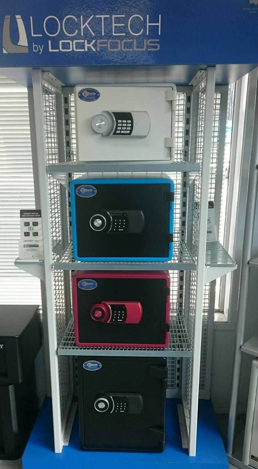 A Display of Safes on A Shelf in A Store — Century Locksmiths In Gatton, QLD