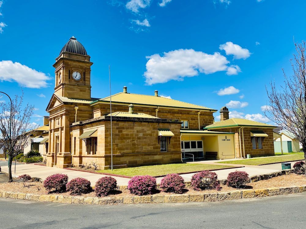A Large Building with A Clock Tower on Top of It — Century Locksmiths In Warwick, QLD
