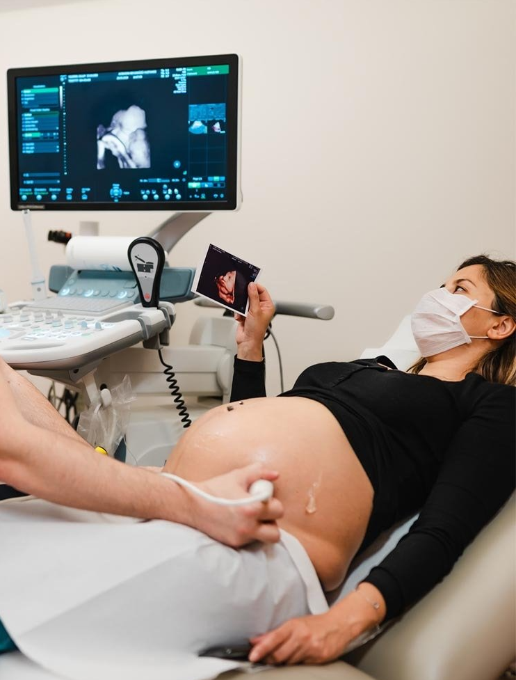 Pregnant Woman Watching Ultrasound — Glendale, CA — Maternity Imaging