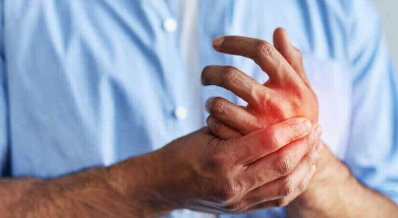 man with painful hand