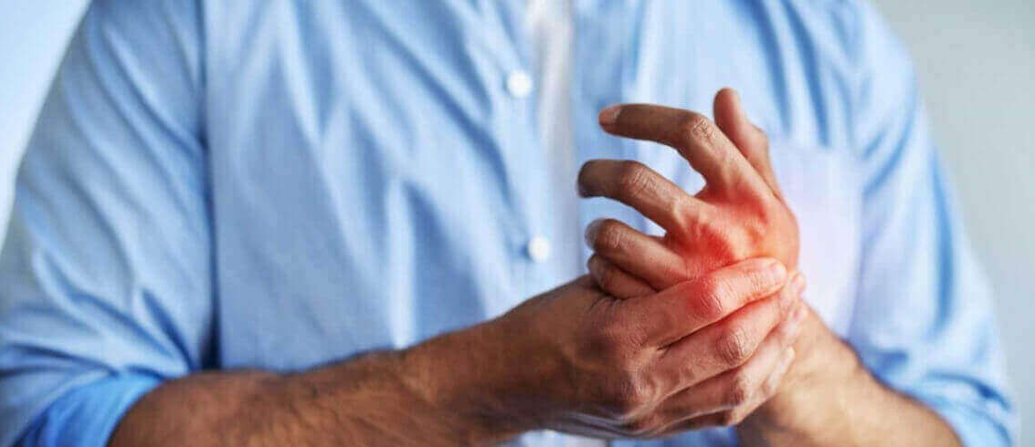 man with burning hands