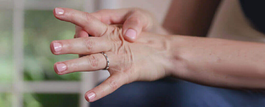 Rubbing your burning hands and fingers