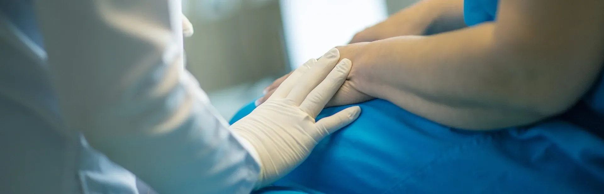 doctor comforts patient