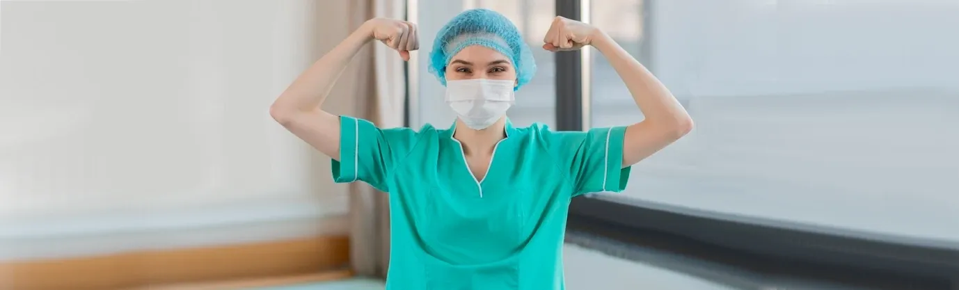 surgeon flexing  muscles