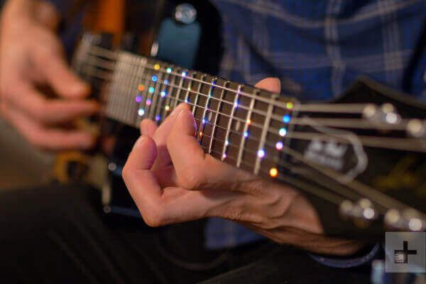 Rapid finger movememt and fretting are reasons you get carpal tunnel from playing guitar.