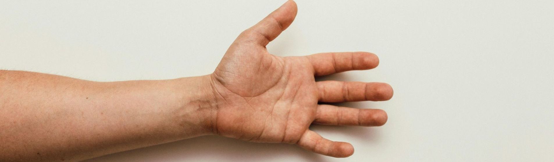 a man's hand and forearm
