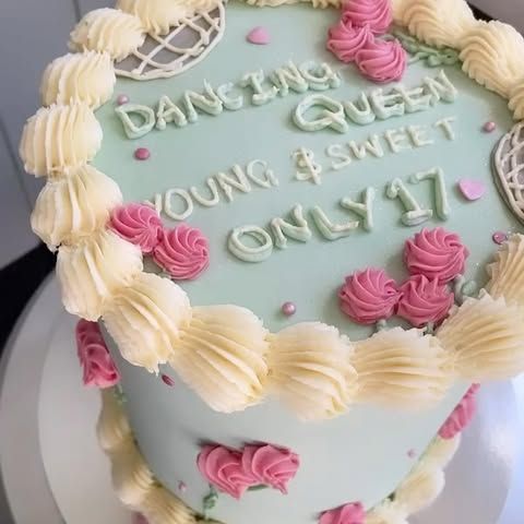 A cake that says dancing queen young & sweet on it