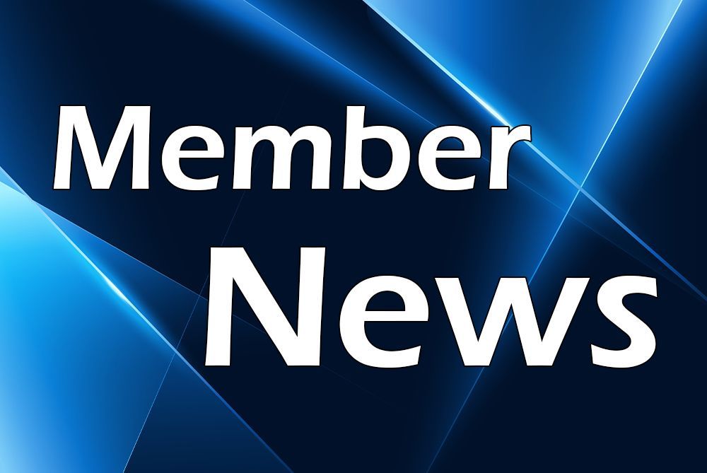 Member News text on dark blue abstract background