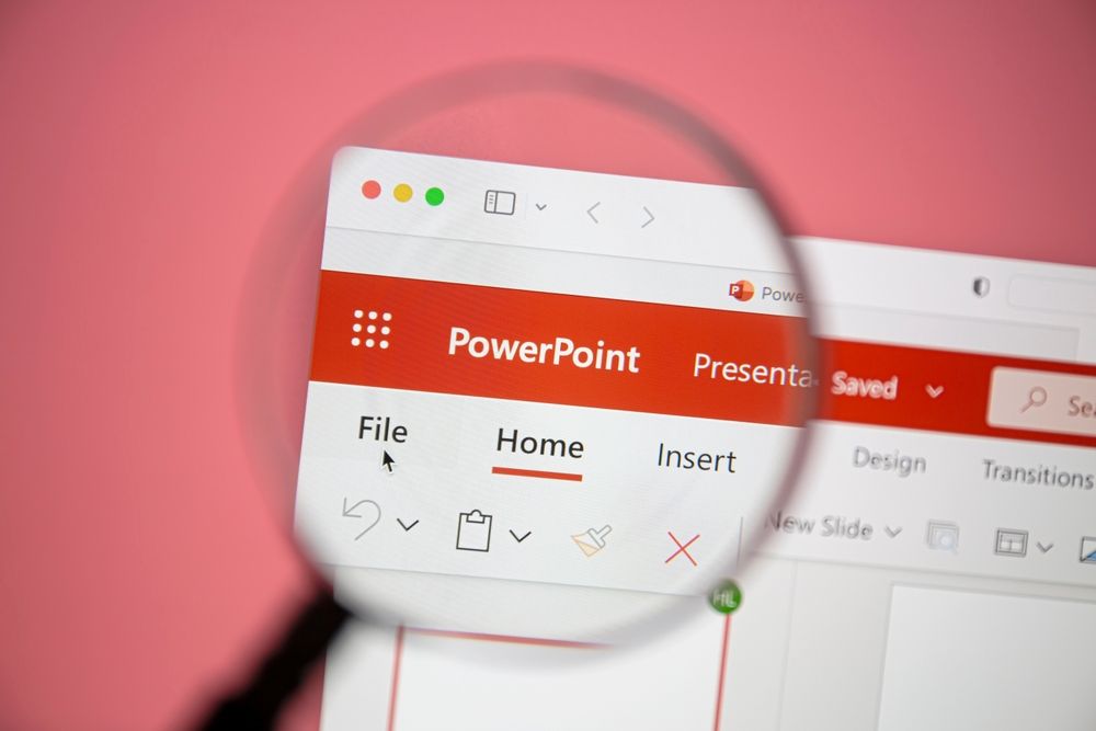 Microscope hovering over a PowerPoint document