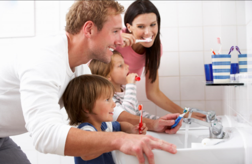Family brushing teeth, fun ways to brush up your child's dental routine blog