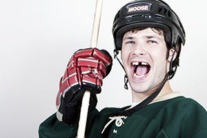 hockey player - front tooth missing - steps to when you lose a tooth blog