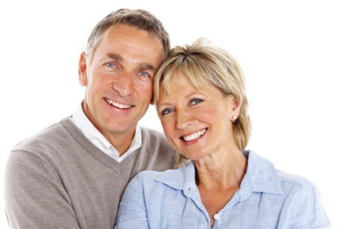 older couple smiling, what to know about dentures blog