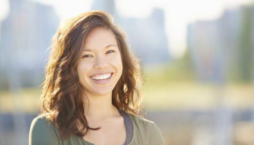 woman smiling, do my teeth affect my overall health blog
