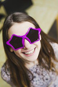 funny woman with funny glasses - smile like a movie star blog