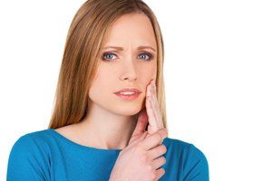 woman in pain, tooth sensitivity blog