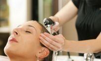 washing hair in hairdressing salon in Oak Flats