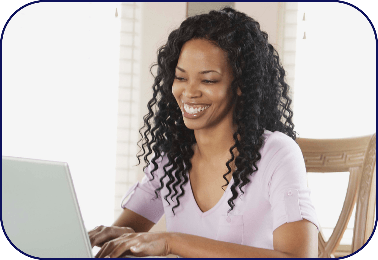 Young woman with a bright smile on a video call on her laptop