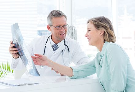 Professional explaining the report to the customer