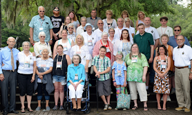 A large group of people are posing for a picture.