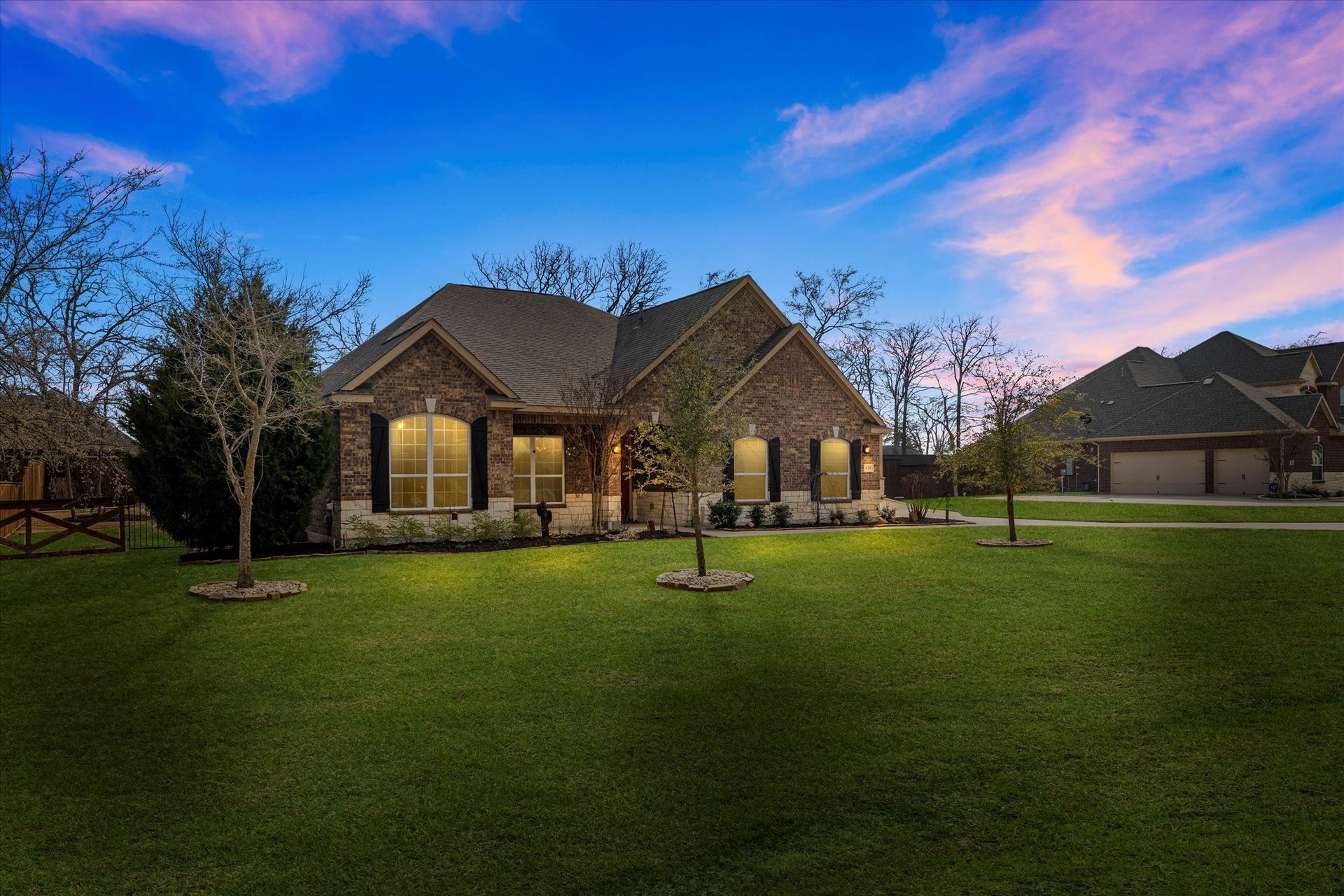 Picture Of Family Looking At The House - Dallas, TX - Petersen Property Group