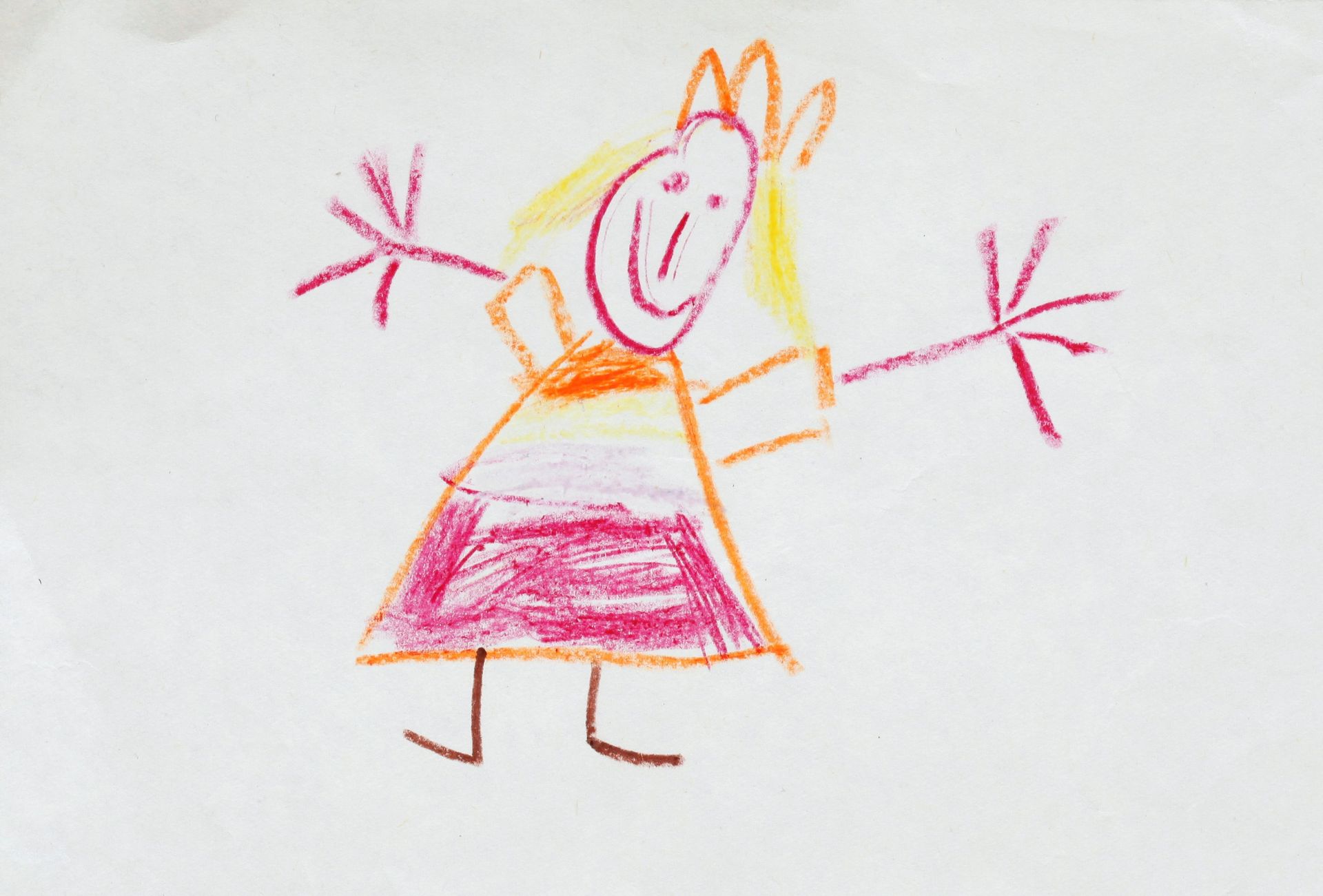 Children's drawing of a girl in pink dress