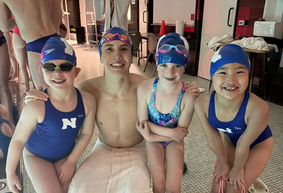 Lessons swimmers and instructor