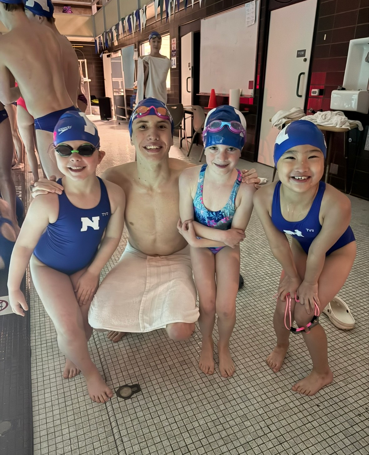 Lessons swimmers and instructor