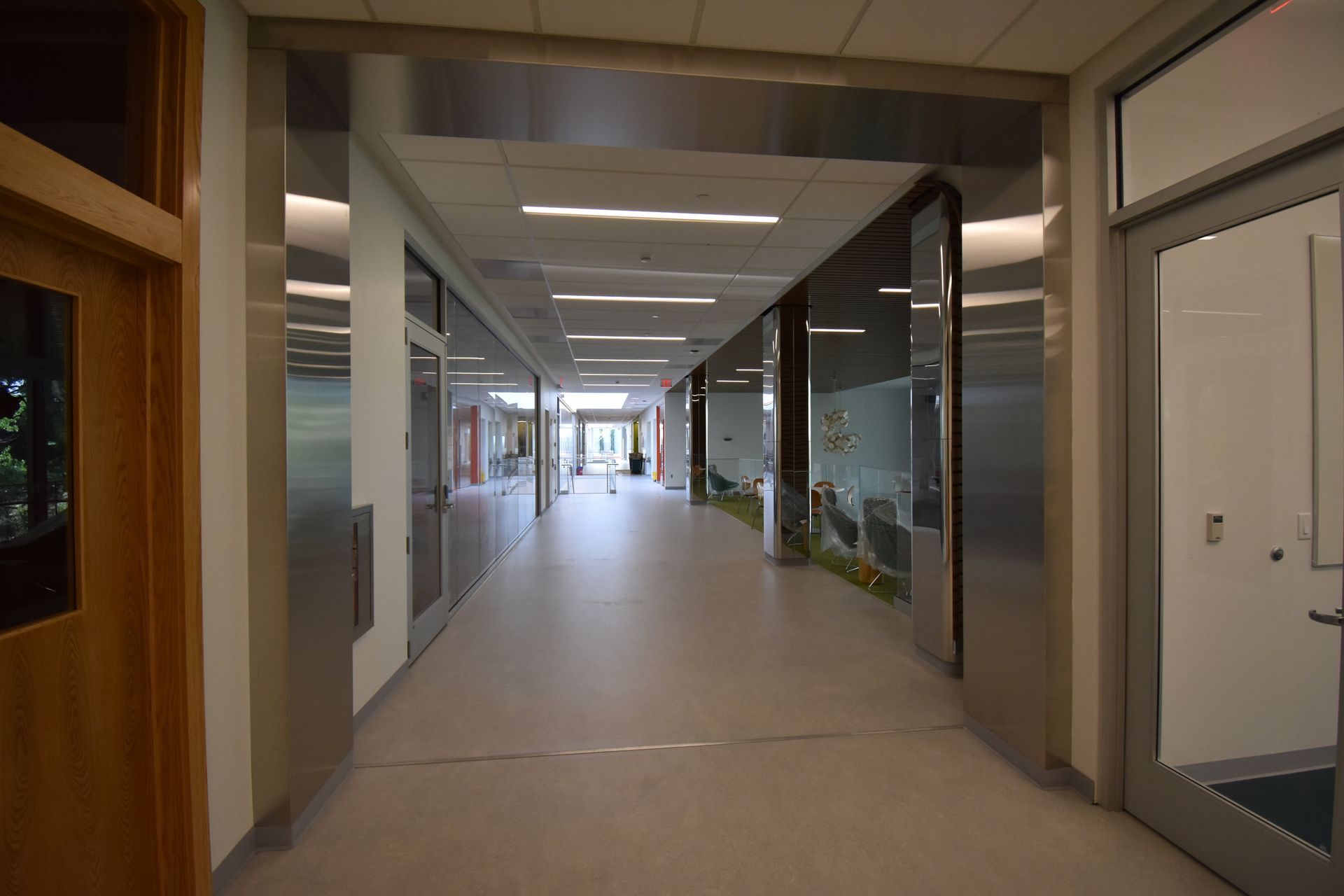 A Long Hallway in a Building with Stainless Steel Walls and Doors | Wooster, OH | Bogner Construction Company