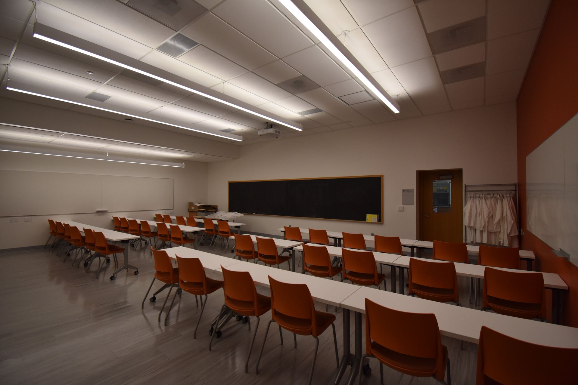 An Empty Room with Long Tables and Chairs | Wooster, OH | Bogner Construction Company