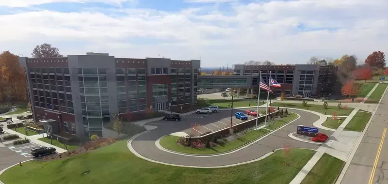 An Aerial View f a Large Building with Cars Parked in Front of it | Wooster, OH | Bogner Construction Company