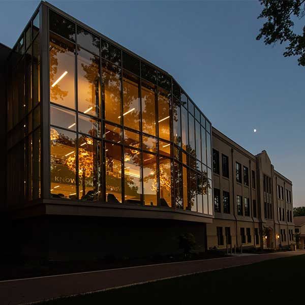 A Large Building with a Lot of Windows is Lit up at Night | Wooster, OH | Bogner Construction Company