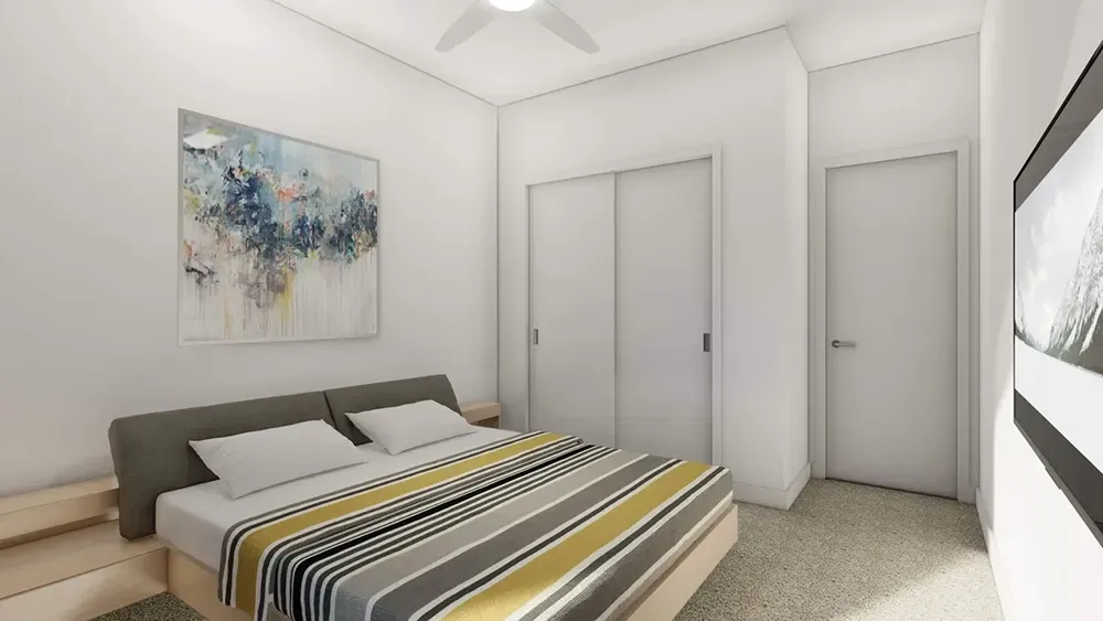 A Bedroom With a Large Bed and a Painting on the Wall | Wooster, OH | Bogner Construction Company
