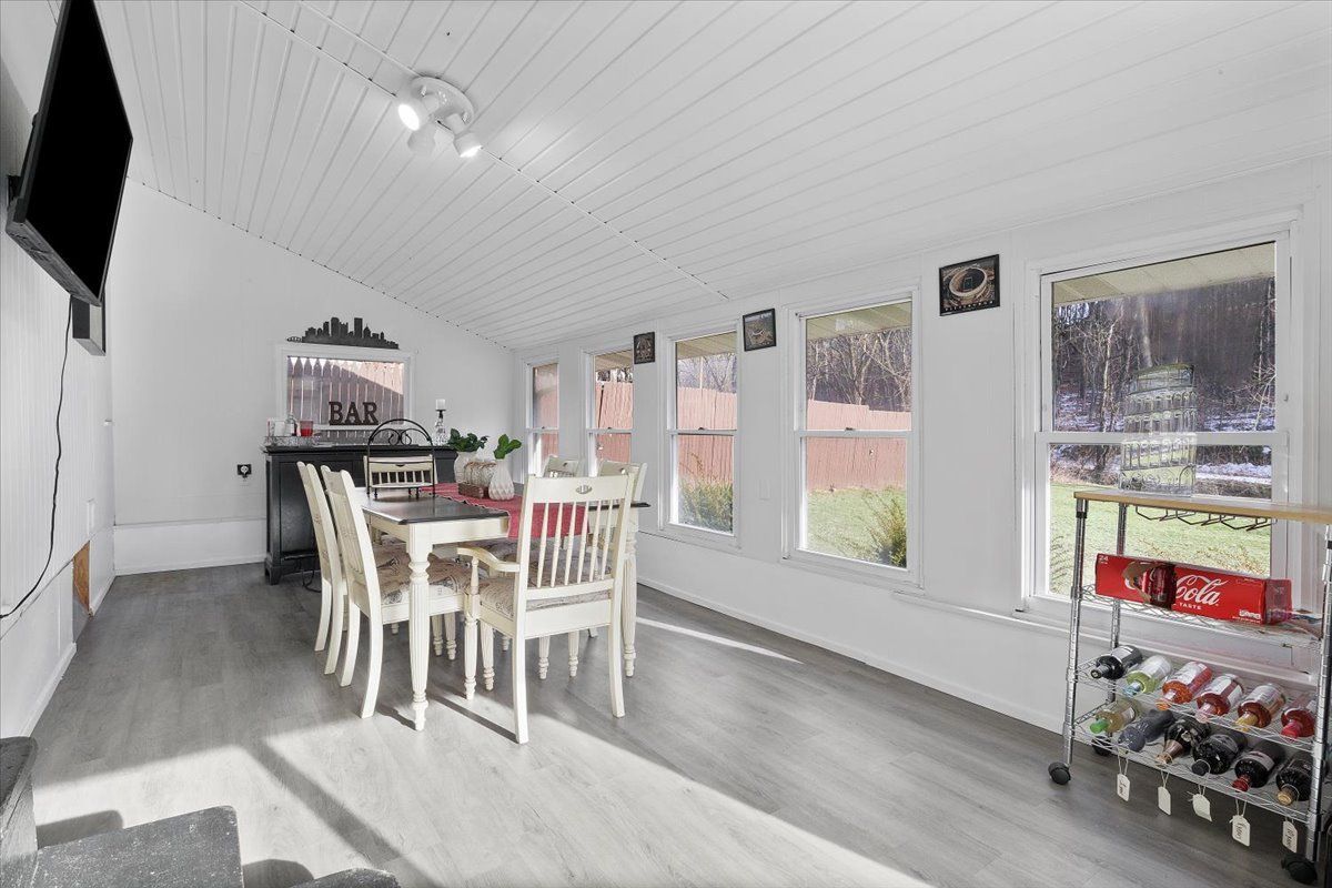 Staging an unused sunroom to define it's function