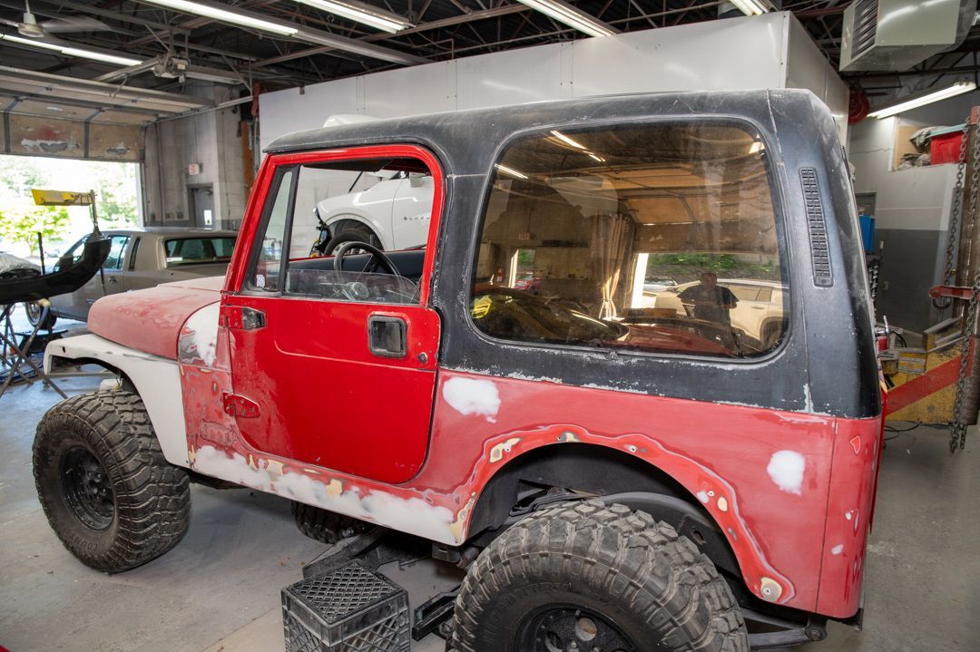 a vehicle mid through a job at Town Line Auto Body