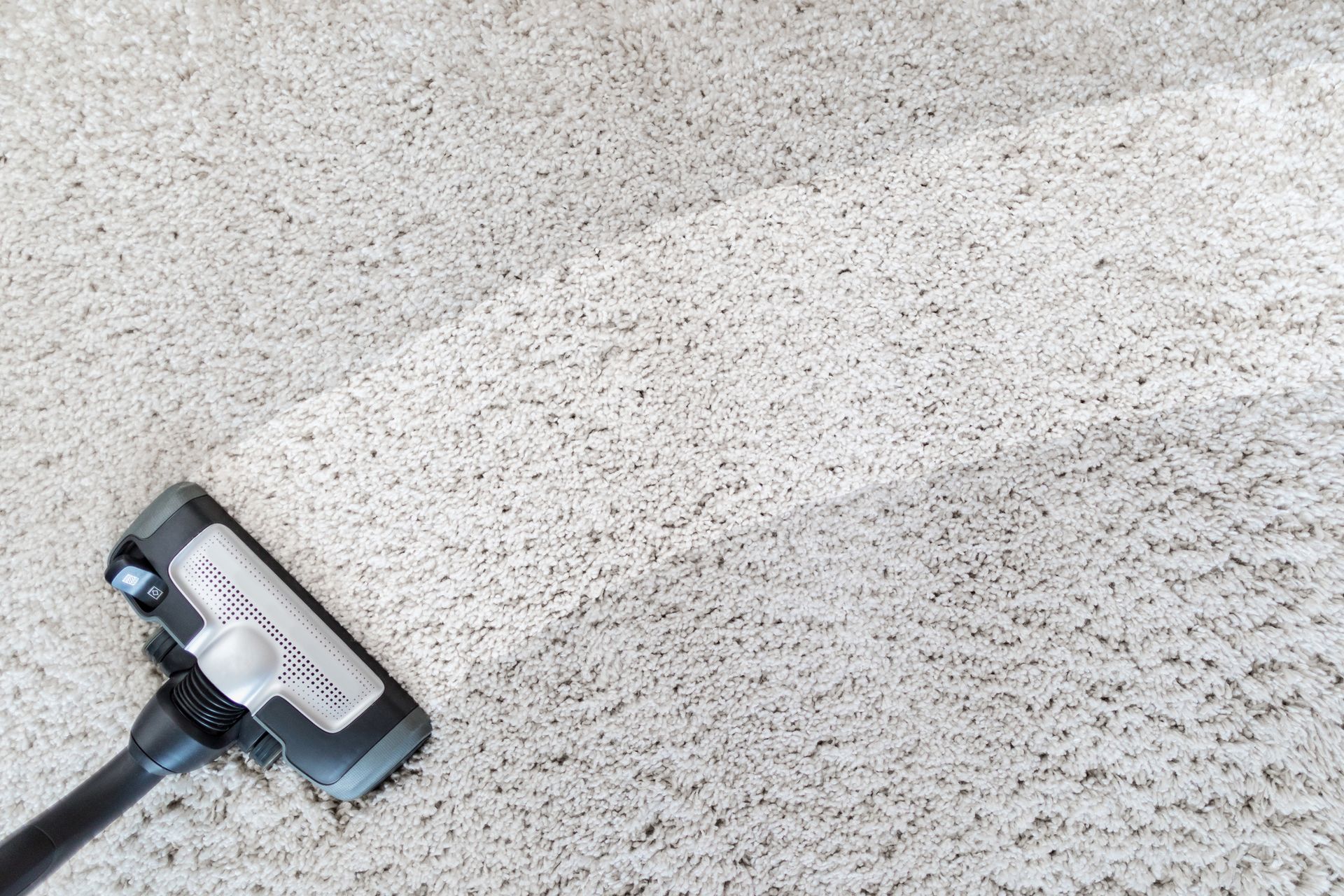 A vacuum cleaner on the floor 
