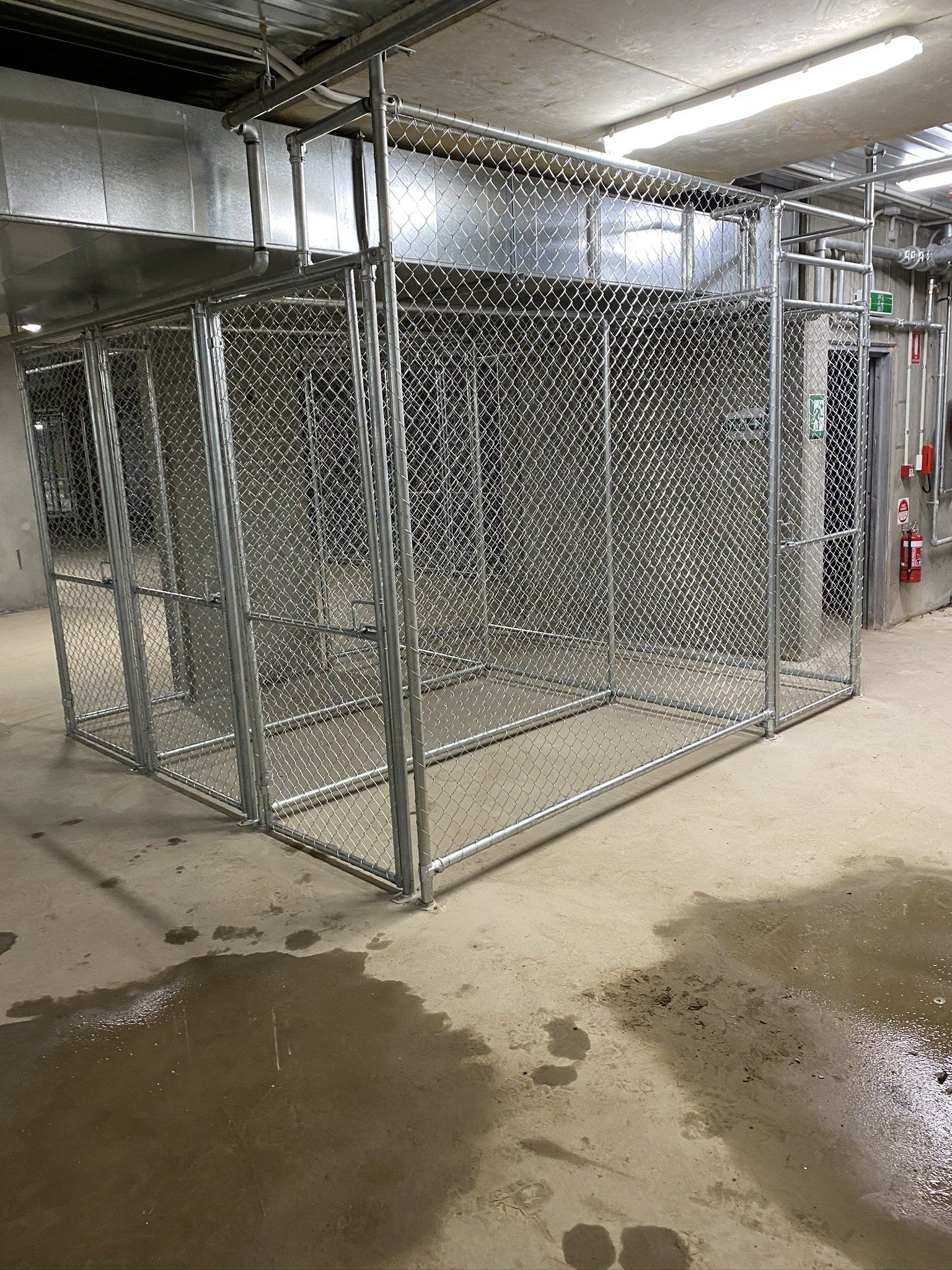 chain mesh storage cage around a mechanical air duct