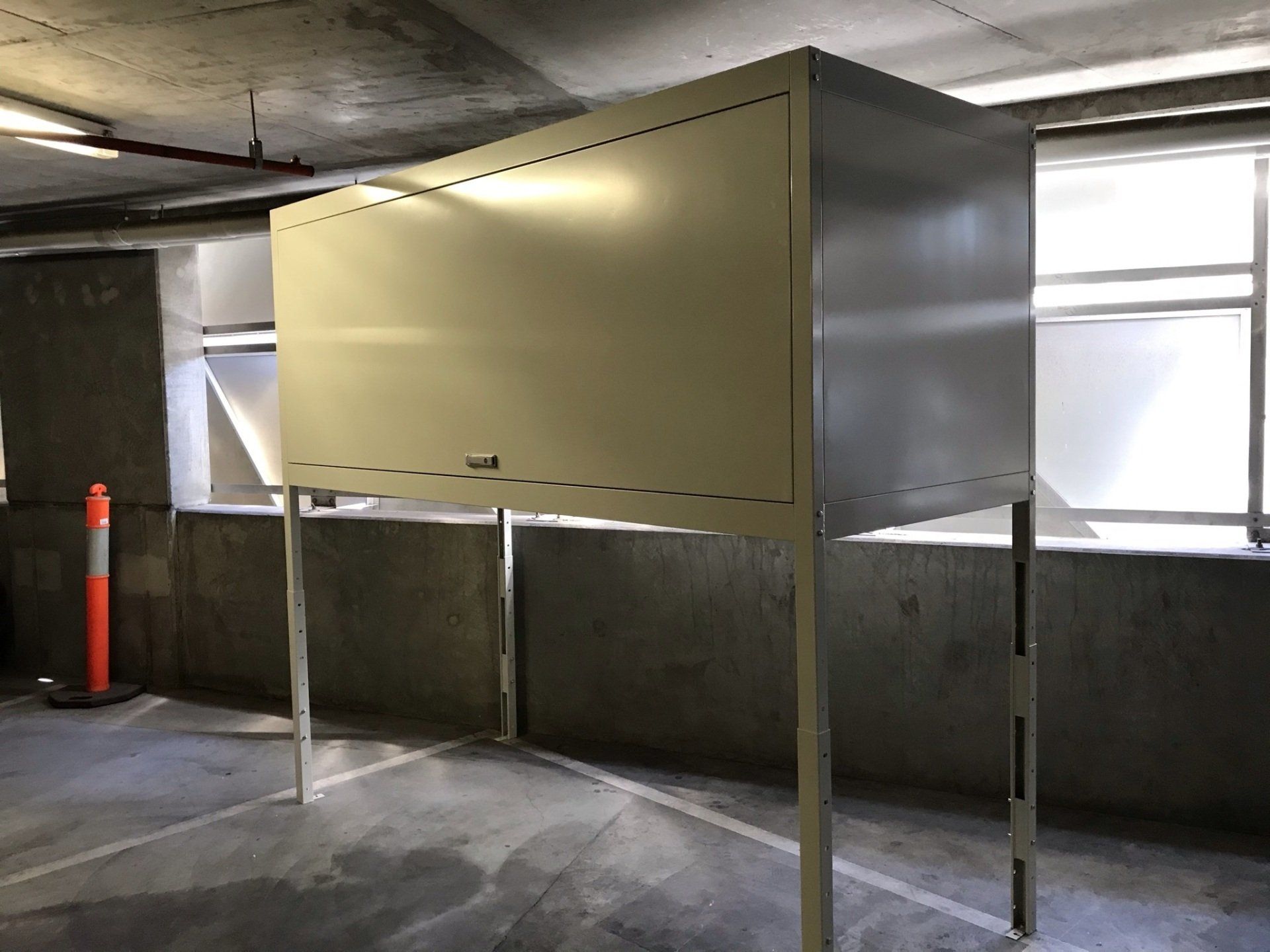 Over bonnet storage unit in a basement