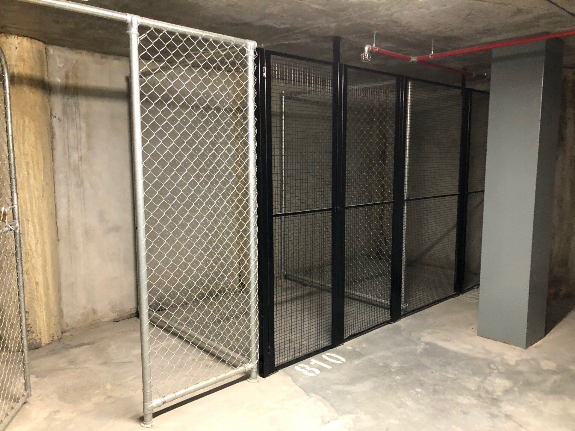 Basement storage cages, galvanised chain link and black powder coated weld mesh