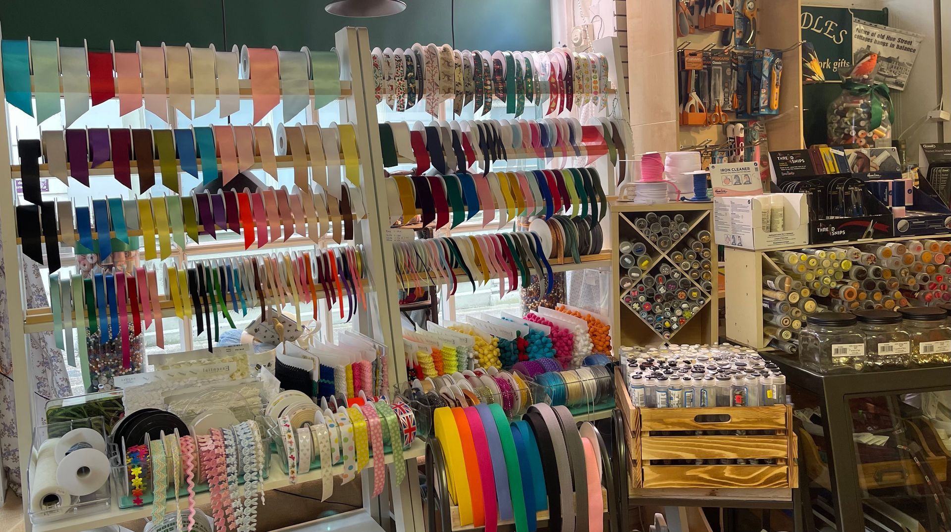 A store filled with lots of craft supplies and ribbons.