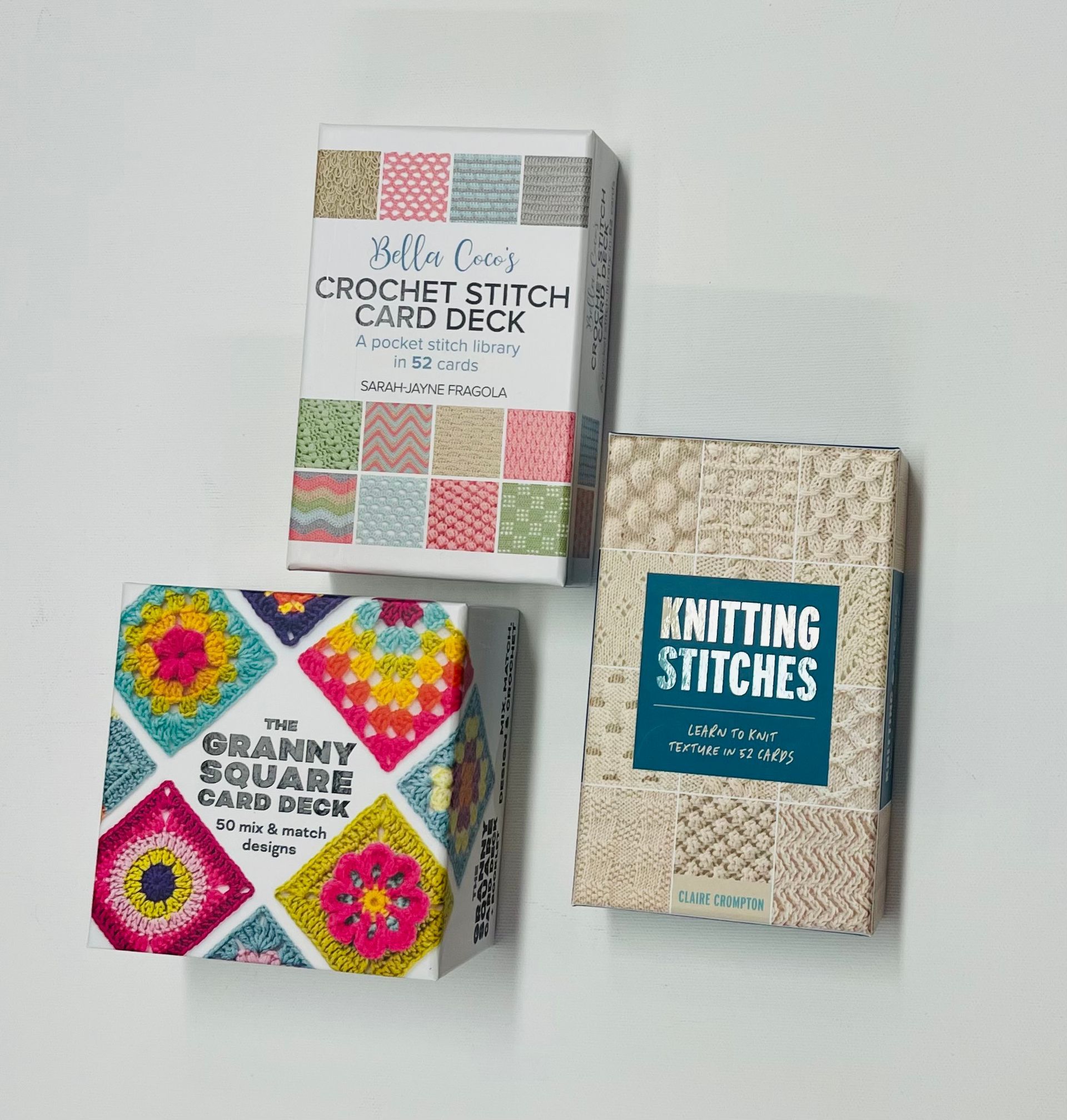 A crochet stitch card deck a granny square card deck and a knitting stitches card deck