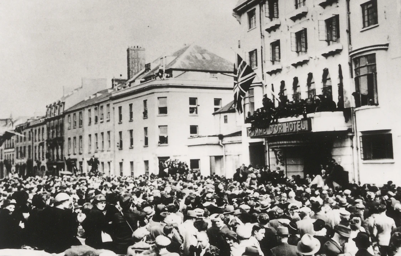 A black and white photo of a crowd in Jersey on Liberation Day