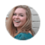 A woman in a blue shirt is smiling in a circle.